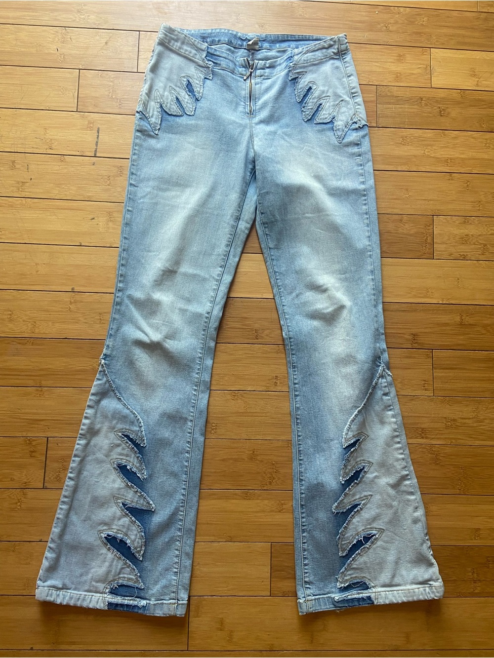 Light Blue Women's Flared Jeans with Distressed Cutout Detail